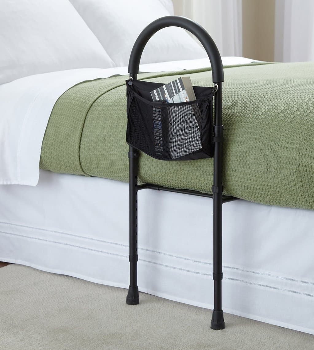 Safety bed rail mobility aid adjustable in height with useful storage pocket